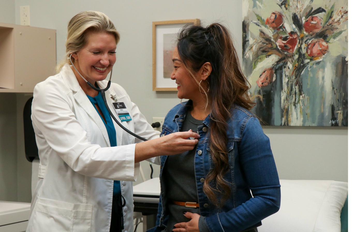 Licensed provider with patient at Alliance Women's Clinic