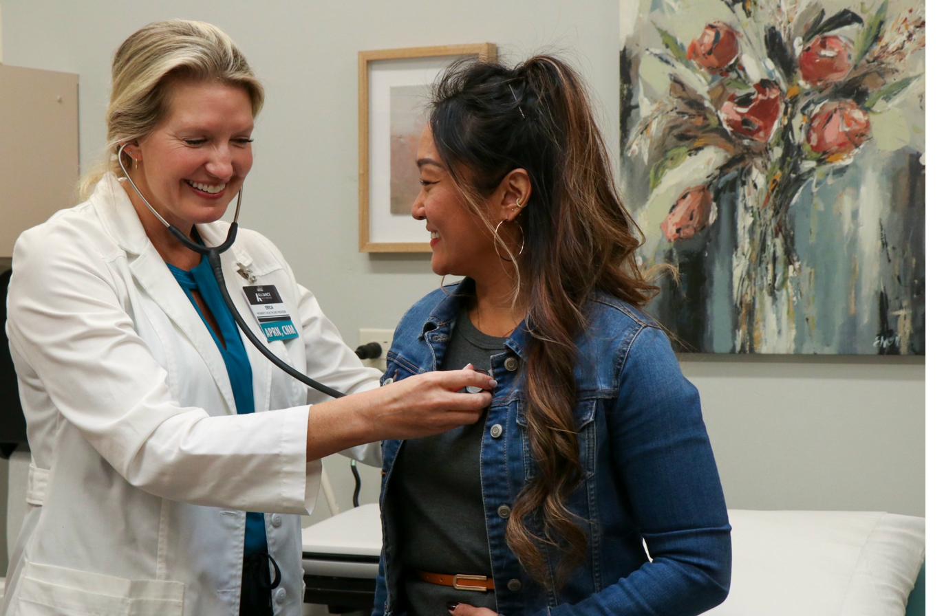 Licensed provider with a patient at Alliance Women's Clinic