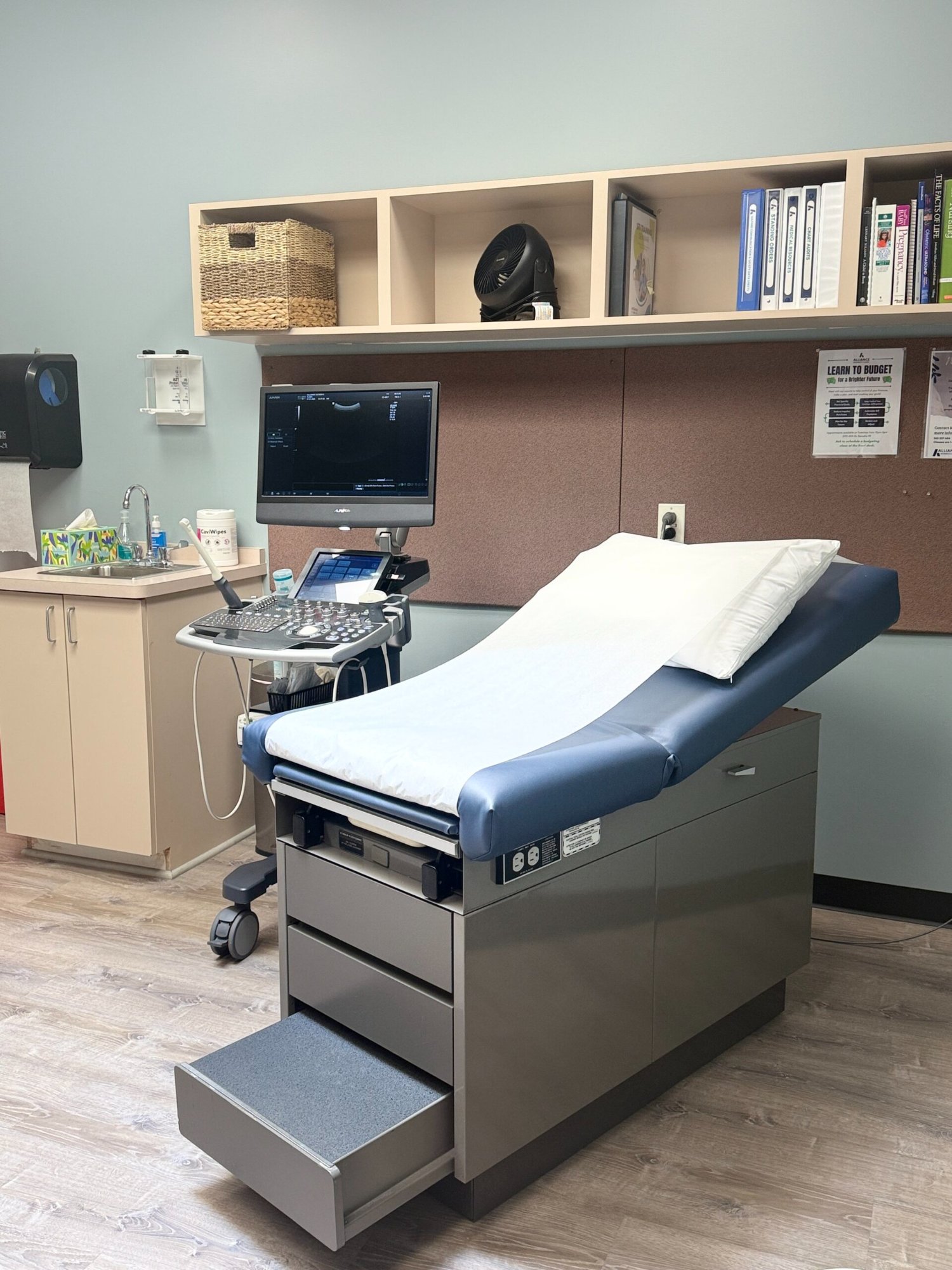 Alliance Women's Clinic exam room with ultrasound
